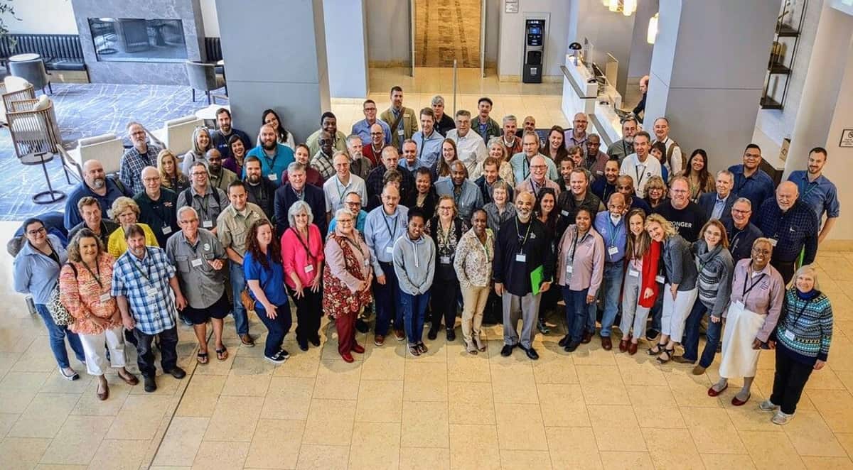 GRMF Conference 2022 attendees photographed from above in a hotel lobby in Morristown, New Jersey